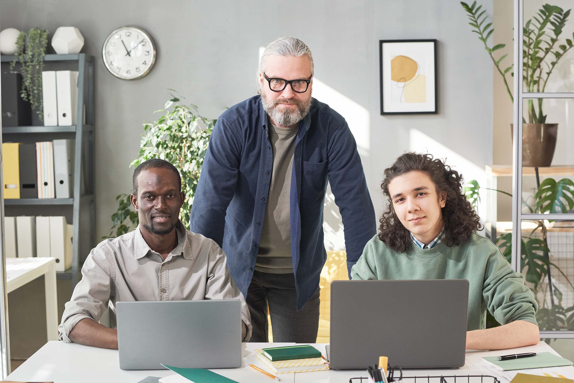 Teacher with students at office